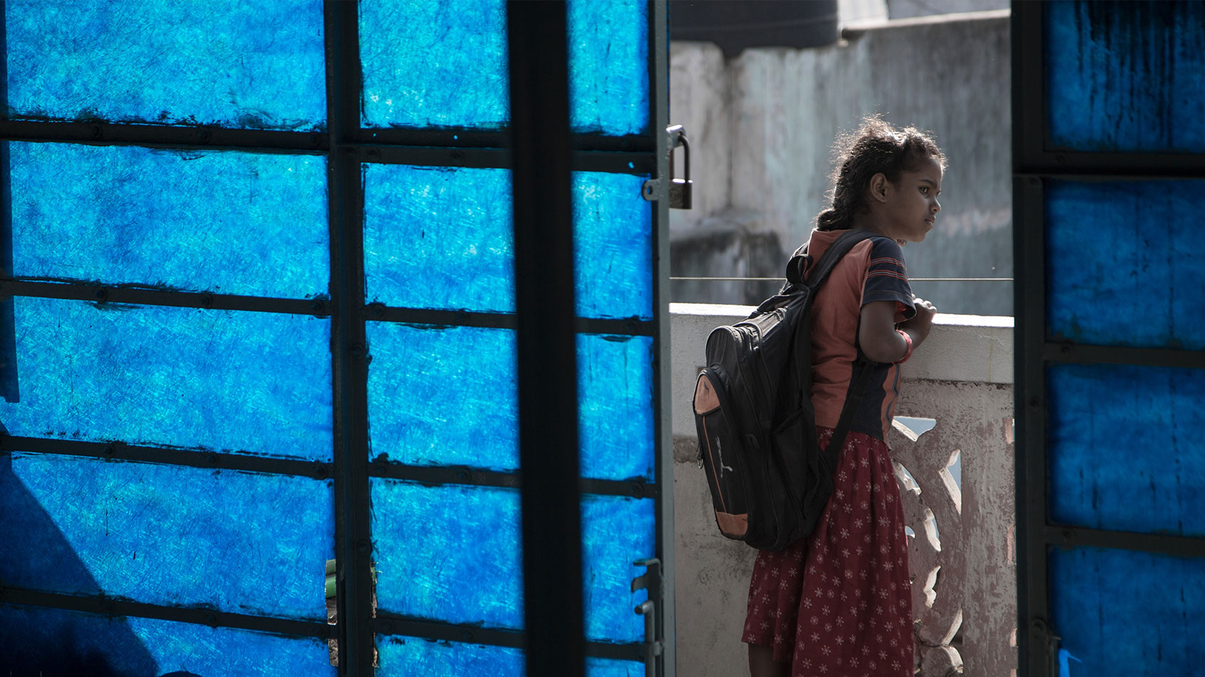 Young girl with school bag